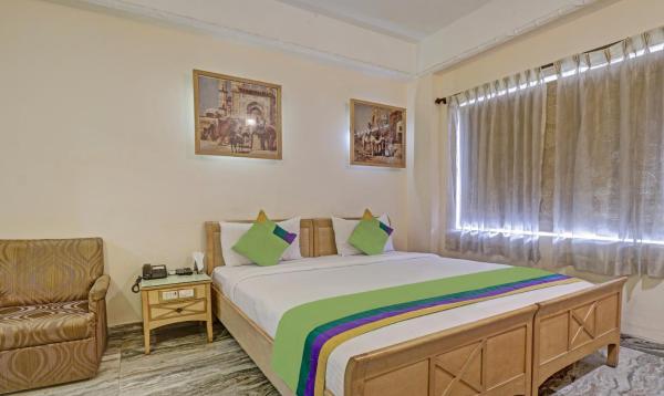 På billedet ses objektet Treebo Komfort Suites, 3 Km From Mysore Palace beliggende i byen Mysore.