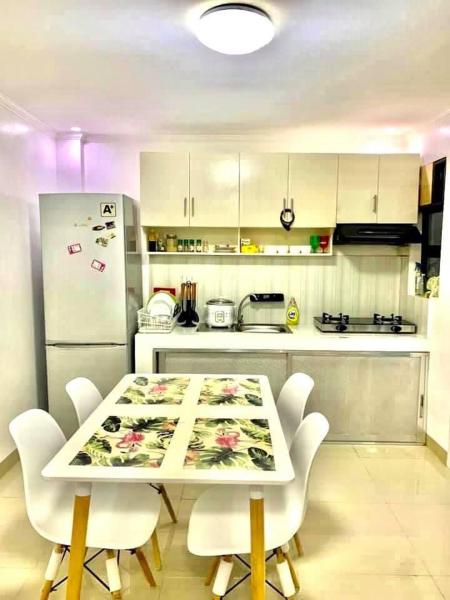 A la foto es mostra l'objecte Cozy Central - Near arca south signal taguig situat a la ciutat de Manila.