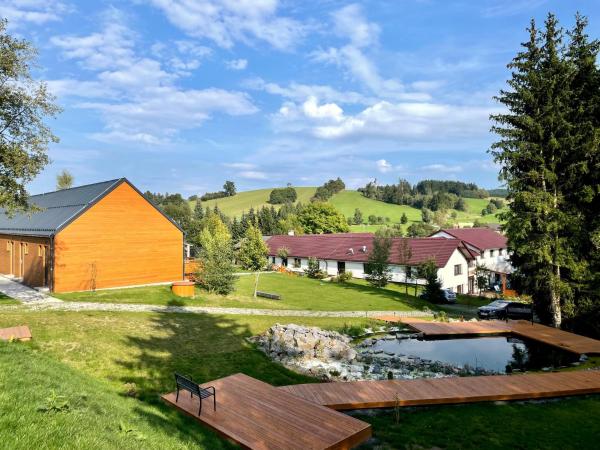 The photo shows the Wellness penzion Marta located in the city of Věcov.
