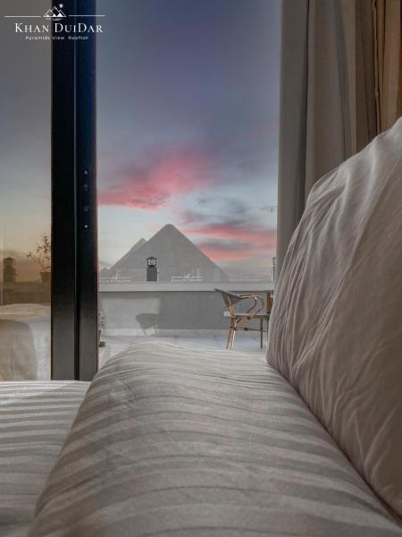 A la foto es mostra l'objecte Khan Duidar Inn - Pyramids View Rooftop situat a la ciutat de El Caire.