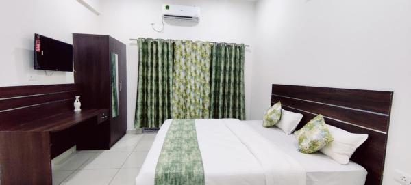 På billedet ses objektet Suvarna Elite - Premium Apartment Hotel beliggende i byen Mysore.