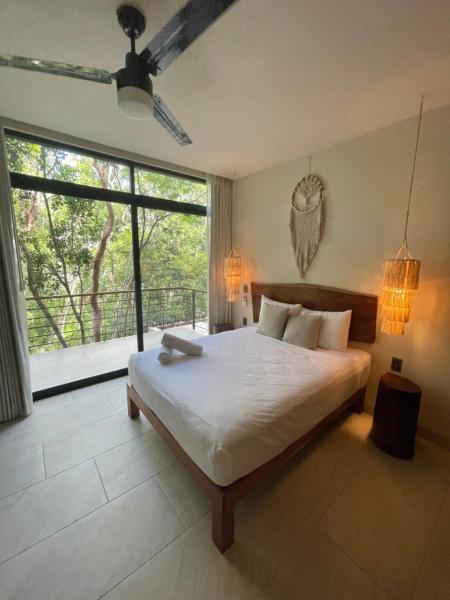 Na zdjęciu widoczny jest obiekt Jungle View 2bed 2bath Condo/ Wi-Fi/ Pool/ Gym położony w mieście Tulum.