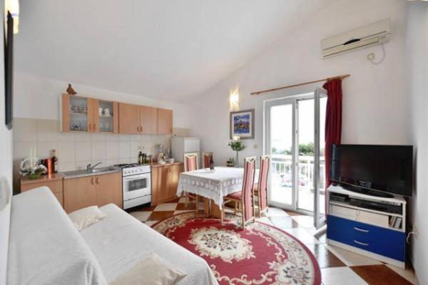En la foto se muestra el objeto Apartment in Duce with sea view, balcony, air conditioning, WiFi 5063-2 ubicado en la ciudad de Duće.