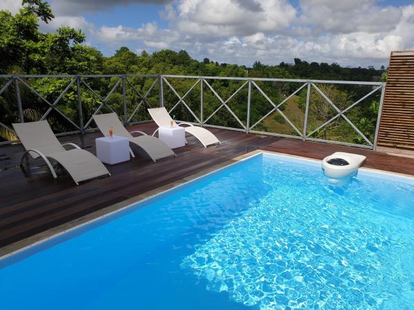 På billedet ses objektet Coin de Paradis Cosy en Guadeloupe avec piscine privée beliggende i byen Deshauteurs.