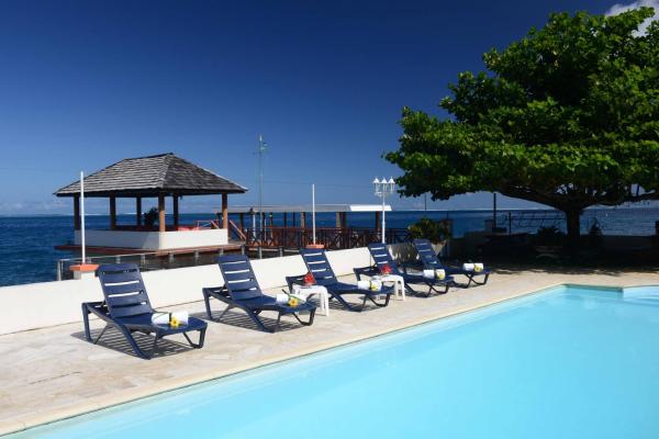 На фото показан объект Pension de famille HITI MOANA VILLA, расположенный в городе Papara.