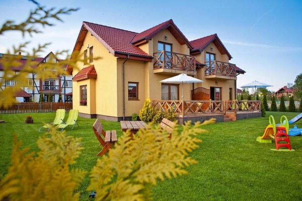 Auf dem Foto ist das Objekt Villa in Rowy near Baltic Sea & National Park in der Stadt Rowy zu sehen.