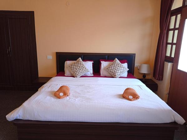A la foto es mostra l'objecte Jas Guest House situat a la ciutat de Mobor Goa.