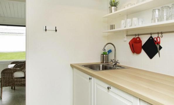 A la foto es mostra l'objecte Cozy Coastal Retreat on the beach situat a la ciutat de Brenderup.