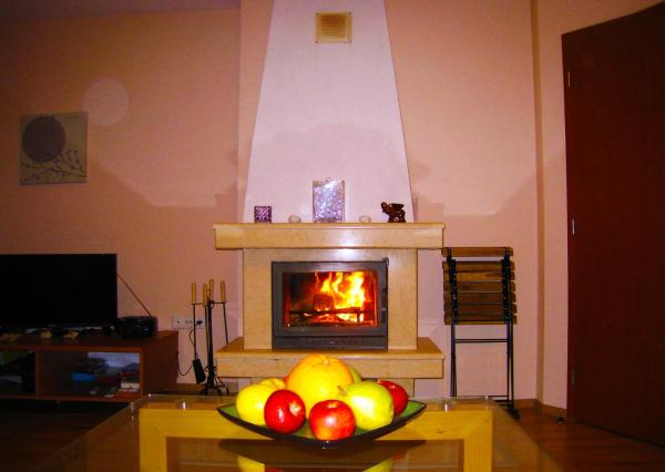 The photo shows the Solar nest with fireplace and mountain view - near ski lift and center located in the city of Bansko.