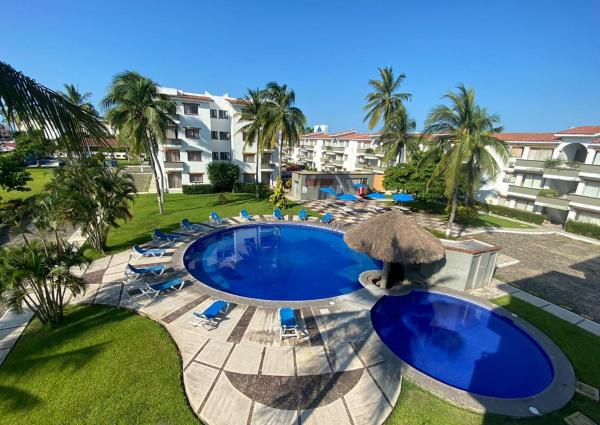 A la foto es mostra l'objecte hermoso condominio suites las palmas con alberca situat a la ciutat de Manzanillo.