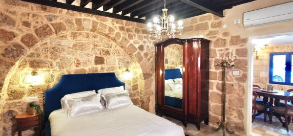 The photo shows the Stylish apartment with private parking by the marina located in the city of ‘Akko.