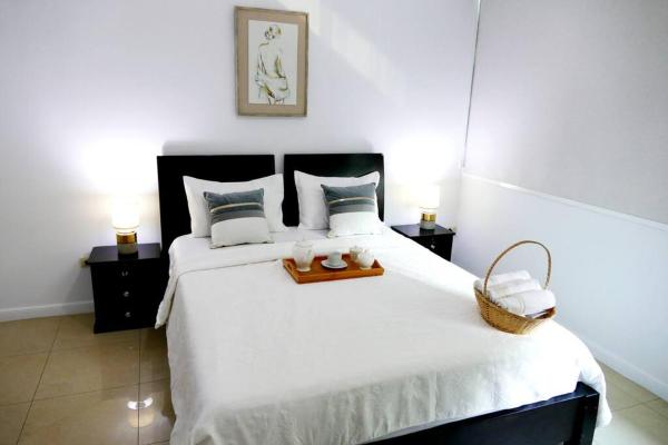 Kuvassa näkyy kohde Ecusuites Puerto Santa Ana - River Junto a Hotel Wyndham, joka sijaitsee kaupungissa Durán.