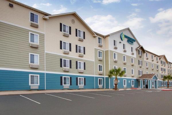 A la foto es mostra l'objecte WoodSpring Suites Pharr situat a la ciutat de Pharr.