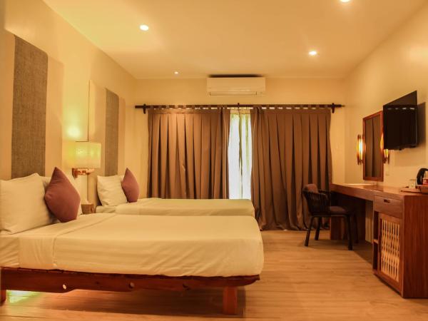 På billedet ses objektet Bluewater Panglao Beach Resort beliggende i byen Panglao.