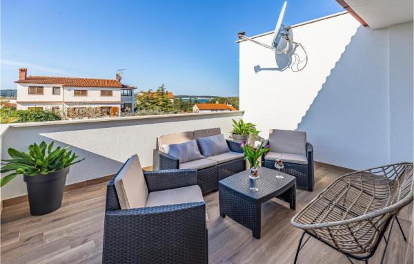 Na zdjęciu widoczny jest obiekt Cozy Apartment In Medulin With Wifi położony w mieście Medulin.