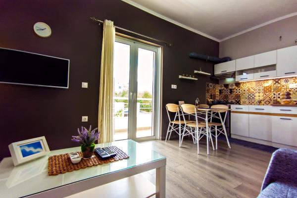 Na foto é possível ver o objeto Maria's modern studio 5min from beach localizado na cidade de Souda.