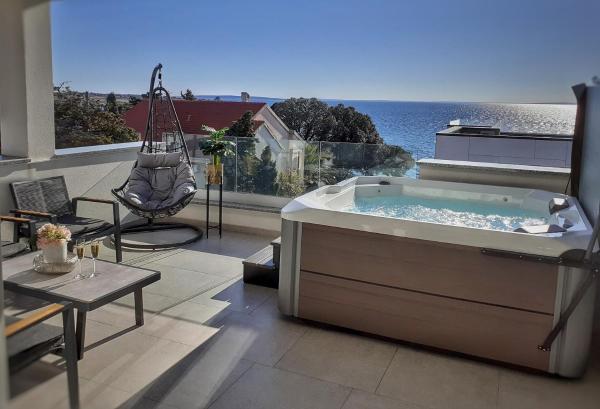 A la foto es mostra l'objecte Penthouse Apartment Perla with Jacuzzi situat a la ciutat de Novalja.