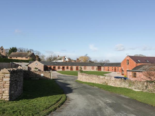 A la foto es mostra l'objecte The Old Sheep Shed situat a la ciutat de Melverley.