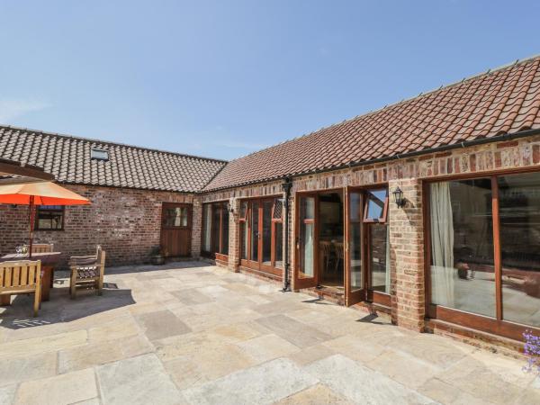 A la foto es mostra l'objecte Wheelhouse Cottage situat a la ciutat de Dalton.