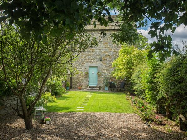 På bildet vises objektet West Wing Cottage som ligger i byen Sandhoe.