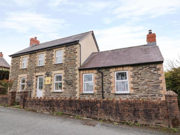A la foto es mostra l'objecte Cozy Cwtch Cottage situat a la ciutat de Llangynllo.
