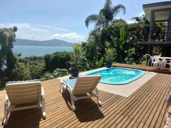På billedet ses objektet Suite com piscina e jacuzzi beliggende i byen Florianópolis.