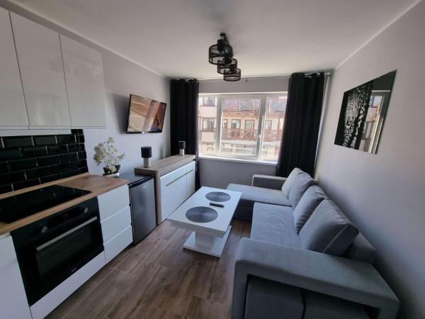 På bilden syns objektet Apartament Słowik Rowy nr 7 som ligger i staden Rowy.