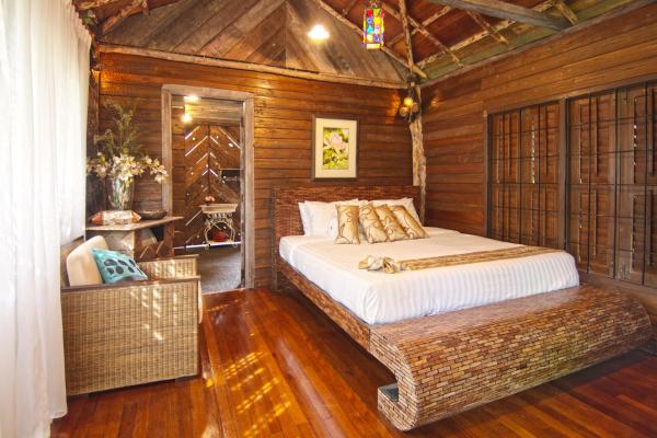 На фото показан объект Fig Tree Hills Resort (花果山度假村), расположенный в городе Байан-Лепас.