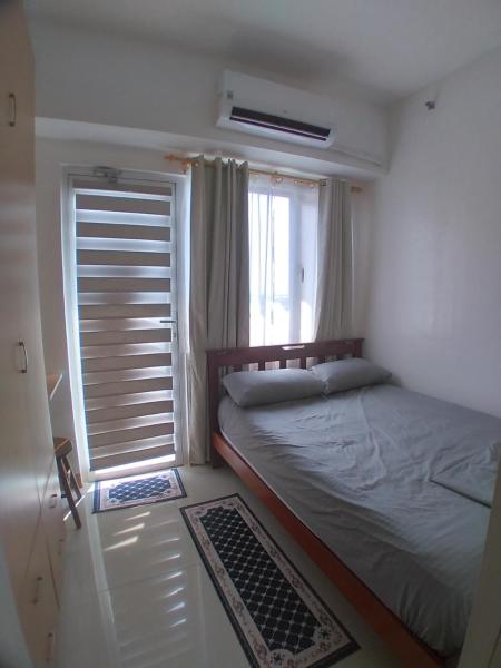 A la foto es mostra l'objecte SM South Residences, 1 bedroom with balcony. situat a la ciutat de Manila.