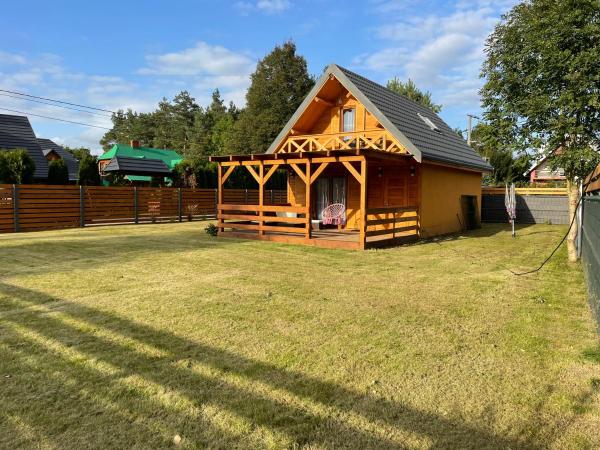A la foto es mostra l'objecte Liliowy Domek situat a la ciutat de Płaska.