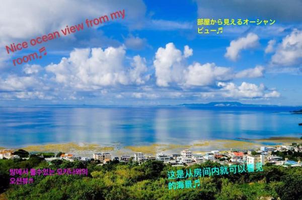 写真にはNagahama市にあるYomitan Ocean View Apartment 401が写っています。
