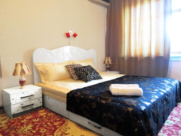 En la foto se muestra el objeto Bishkek City Apartments ubicado en la ciudad de Tokolʼdosh.