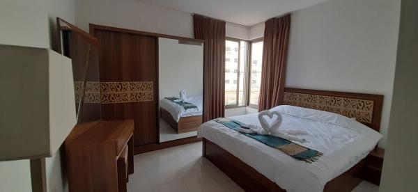 På billedet ses objektet Furnished Apartments Near McDonald's Al-Madina Al-Monawara St beliggende i byen Amman.