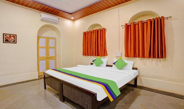 A la foto es mostra l'objecte Treebo Cecil Resort Matheran situat a la ciutat de Matheran.