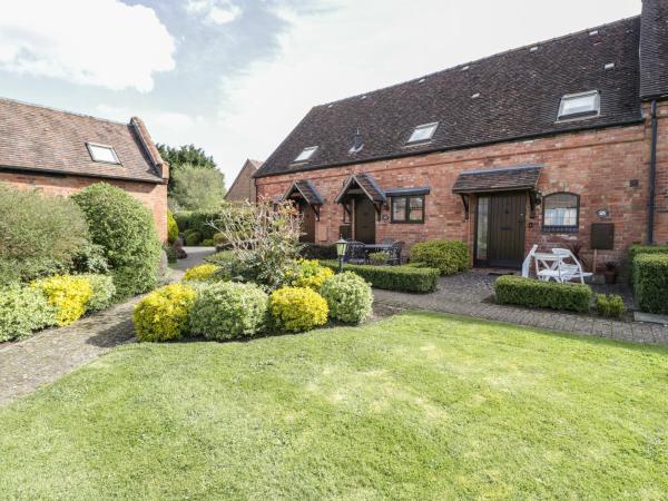 A la foto es mostra l'objecte Burford Cottage situat a la ciutat de Quinton.