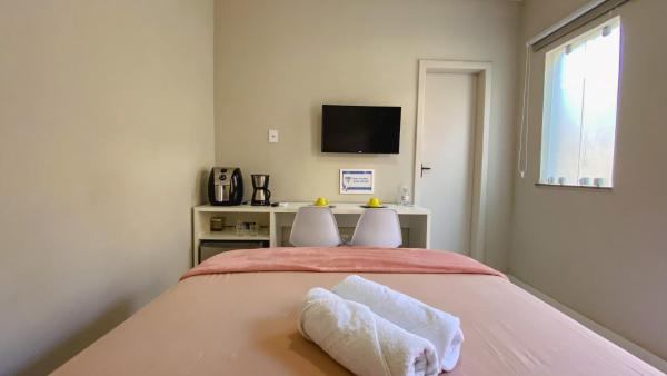 照片显示了位于Ilhéus市的Suíte CASAL independente em Guest house物件。