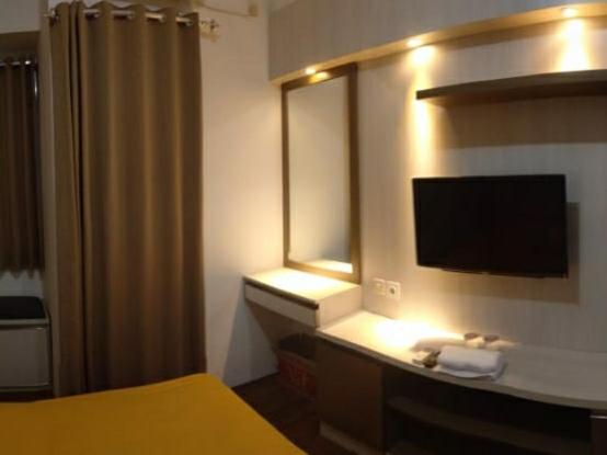 写真にはRawasuren市にあるApartemen Riverview Residence Jababeka at KiNGDOM Rent Apartment Solutionが写っています。