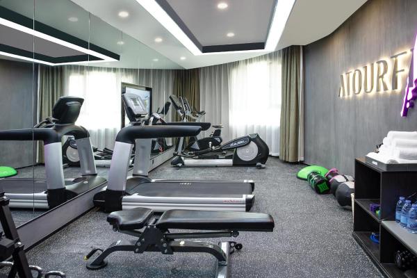 The photo shows the Atour Hotel Hotan Unity Plaza located in the city of Hoten.