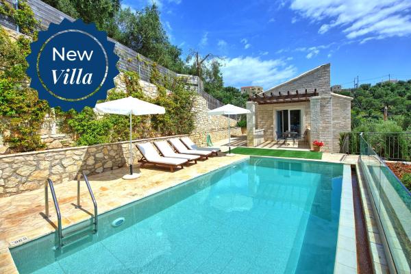 Na fotografii je vidět objekt Villa Jacaranda by PosarelliVillas nacházející se ve městě Kavalléraina.