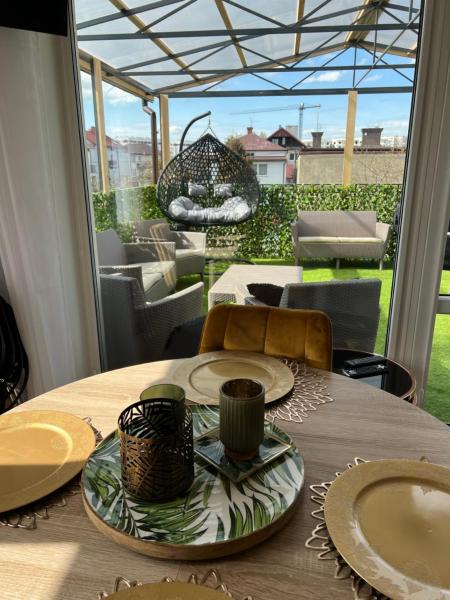 The photo shows the Comfort Zone Ostróda Villa Apartment Duplex located in the city of Ostróda.