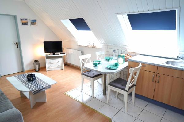 The photo shows the Ferienwohnung Wangerooge located in the city of Neuharlingersiel.