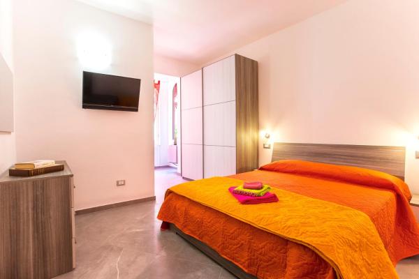 På bildet vises objektet Nonna Adelina Apartments & rooms som ligger i byen Alghero.