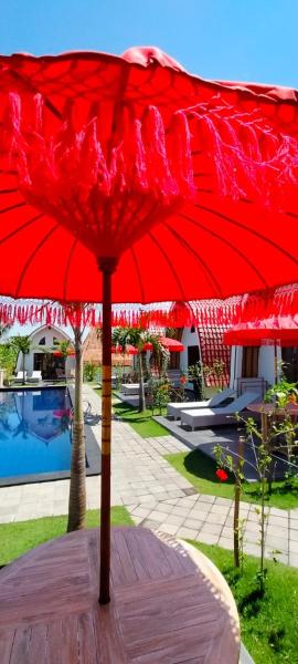 The photo shows the Pearl Villas balian beach located in the city of Balian.