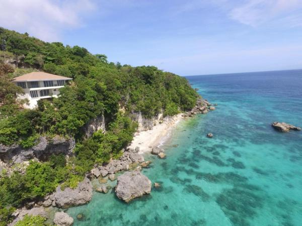 A la foto es mostra l'objecte Noor Villa - Luxury 3 Bed, 2 Bath Apartment with Stunning Panoramic Sea View, Private Beach situat a la ciutat de Tabugon.