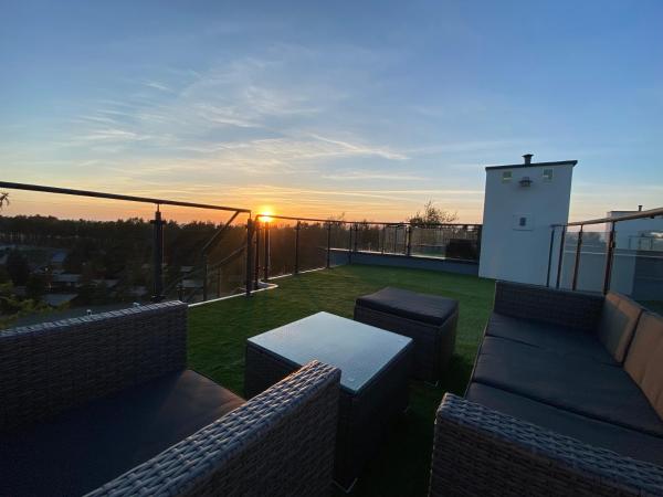 Auf dem Foto ist das Objekt Słoneczny Taras i Morska Bryza in der Stadt Rowy zu sehen.