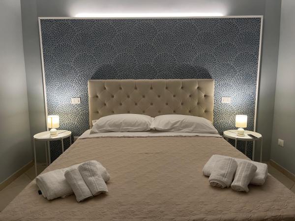 A la foto es mostra l'objecte Minioto Rooms situat a la ciutat de Noto.