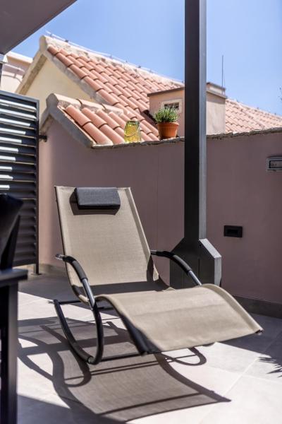 Foto 4: Main Square Duplex with Rooftop Terrace