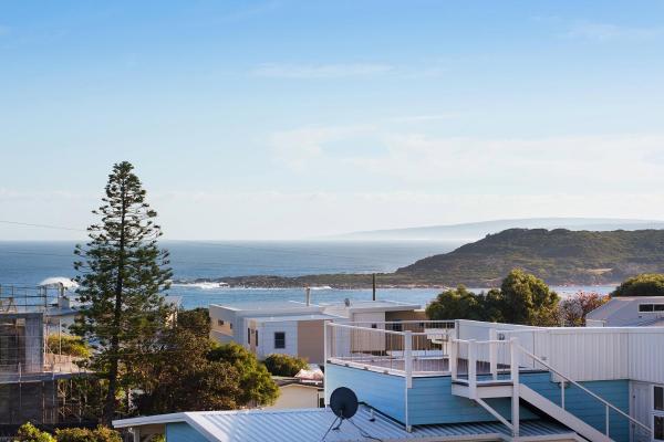 The photo shows the Gracetown Beach House - relaxing beachside holiday located in the city of Gracetown.