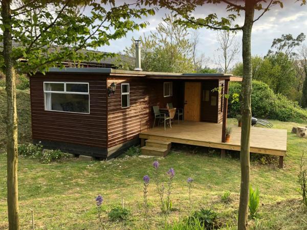 A la foto es mostra l'objecte Cozy and peaceful cabin 15 mins from Lyme Regis situat a la ciutat de Thorncombe.