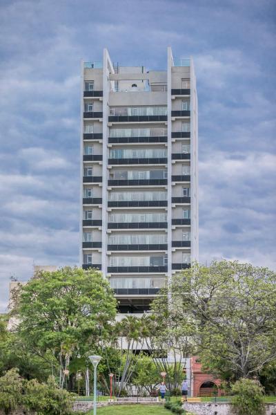 The photo shows the Asuncion Rent Suites Centro located in the city of Asuncion.